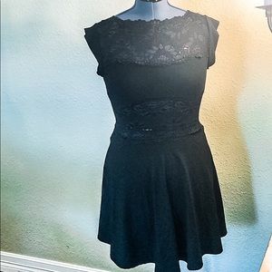 NWT Bebe Dress. Peek a boo lace top and middle.